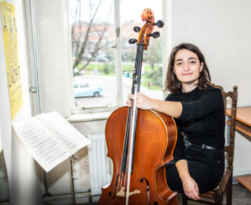 Maria studying the cello at home